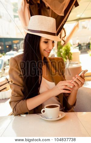 At Dinner Young Woman Reading Messege On Phone In Cafe