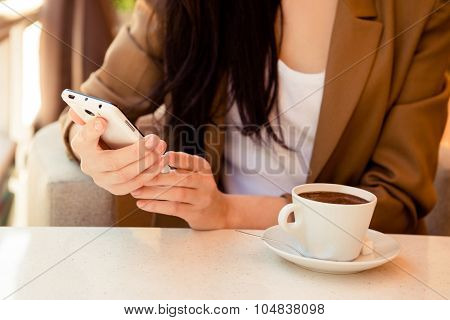 At Dinner Young Woman Reading Messege On Phone In Cafe