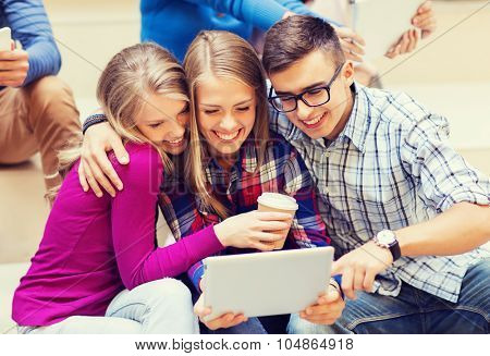 education, friendship, technology, drinks and people concept - group of smiling students with tablet pc computer and paper coffee cup taking selfie or video