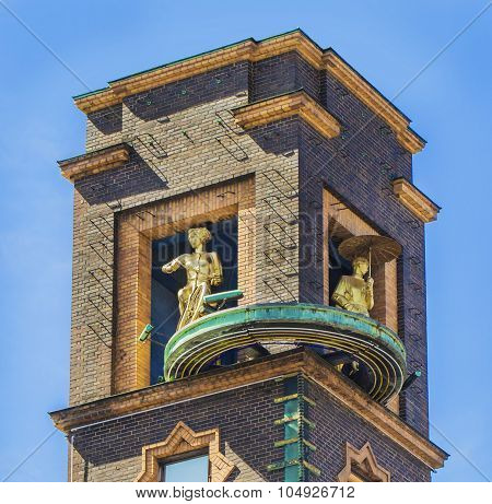 The well-known barometer of Copenhagen with a sculpture of a girl on a bicycle.