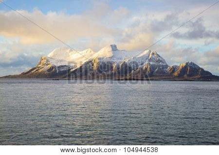 View of a Norwegian fjord with snowy mountains Nordland Norway