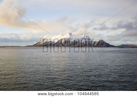 View of a Norwegian fjord with snowy mountains Nordland Norway