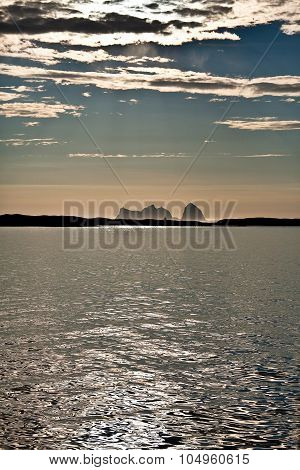 Midnight sun on Norwegian sea landscape with Traena Island, Norway