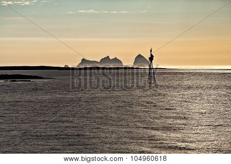 Midnight sun over Norwegian Landscape Traena Island