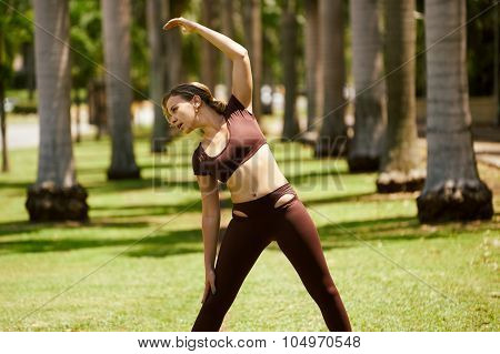 Woman Doing Stretching Before Sports Training At Morning-2