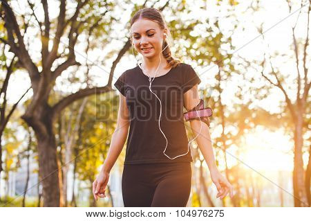 Young Beautiful Athlete Girl Training Precision With Armband