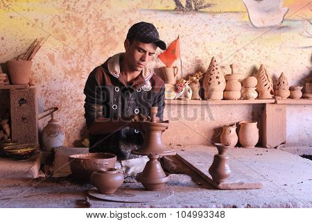 Ceramics. Manual production. A man at work.