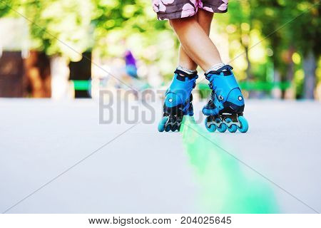 Inline Roller Skater On A Slalom Course