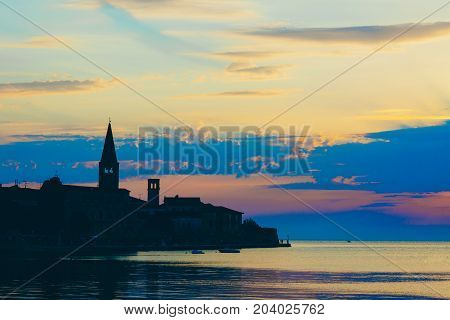 Sunset On The Seashore. City View Walk Along The Seafront