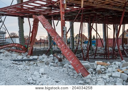 Bended steel beam on a demolished building