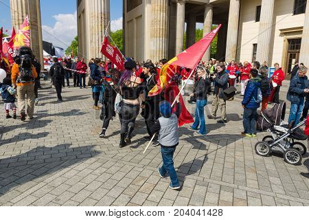 BERLIN - MAY 01 2015: International Labor Day. Demonstrators near the Brandenburg Gate.