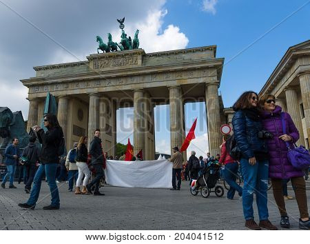 BERLIN - MAY 01 2015: International Labour Day. Demonstrators near the Brandenburg Gate.