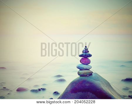 Stones Balance On Rounded Stone At Sea, Concept Inspiration. Beautiful Landscape Background