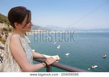 An Elegant woman overlooking the Amalfi Coast