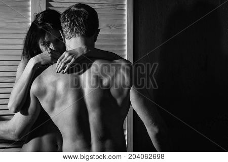 Young Couple Of Muscular Macho Man And Pretty Sexy Woman