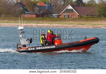 Vordingborg Denmark - May 25. 2017: Danish SAR sea rescue boat sailing near the beach