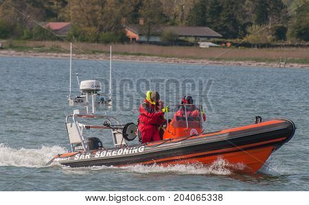 Vordingborg Denmark - May 25. 2017: Danish SAR sea rescue boat sailing near the beach