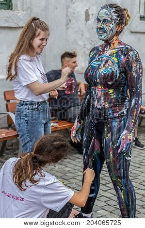 TIMISOARA ROMANIA - SEPTEMBER 8 2017: Face and body painting of a woman. 3D art symbolizing on live at the street inside the CheckART Carnival organized by the City Hall Timisoara. Liberty Square.