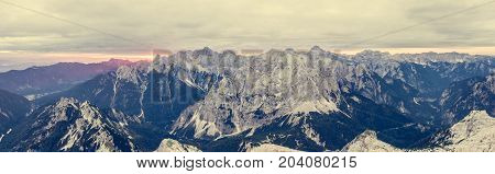 Panoramic view of mountain ridge at sunrise. Julian Alps in Slovenia.