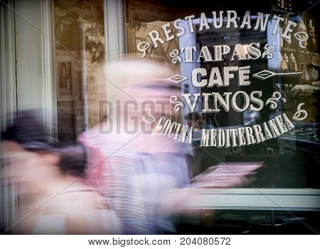 Showcase of traditional bar written in Spanish, conceptual image, blur selective