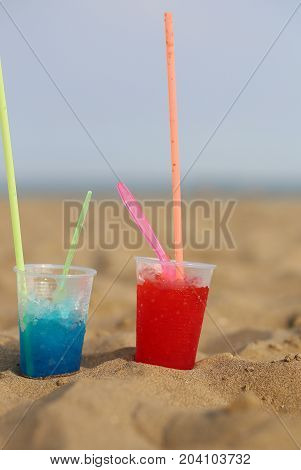 Grenadines With Colorful Syrup And Refreshing Ice