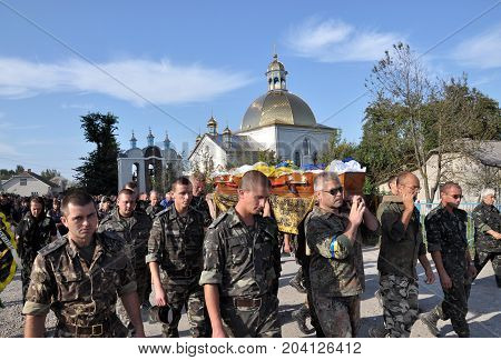 Rosokhach - Chortkiv - Ukraine - September 5 2014. Villagers and district Rosokhach say goodbye to Ukrainian soldier killed in Donbas in the war with Russia