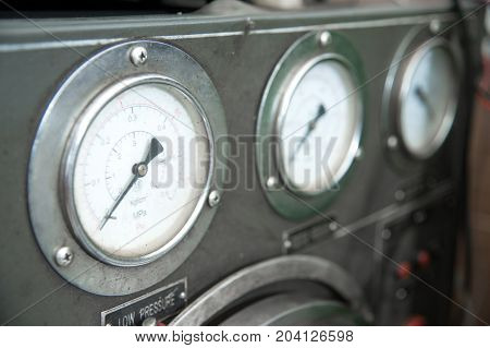 close-up high pressure diesel fuel pump test bench on work