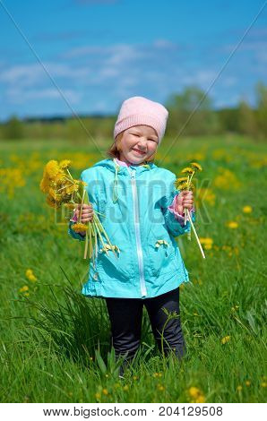 shappiness mall girl on meadow with  dandelion
