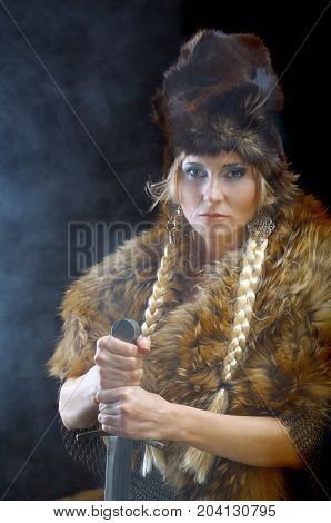 Valkyrie. medieval northern Viking girl with sword