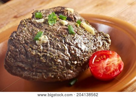 roast beef farm-style.farmhouse kitchen , close up  traditional  meal