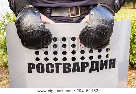 Russian riot police used shields. Text in russian: 