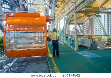 OSAKA, JAPAN - JULY 18, 2017: Close up of Tempozan Ferris Wheel in Osaka, Japan. The wheel has a height of 112.5 metres, it's opened in 1997, situated in Tempozan Harbor Village.