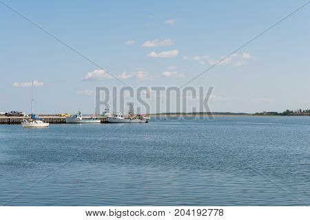 Fishing boats tied to the dock North Rustico Prince Edward Island Canada