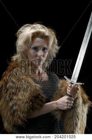 medieval Valkyrie. Viking romantic girl with sword