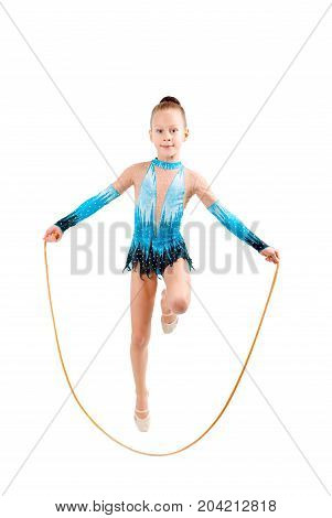 young girl doing gymnastics position over white