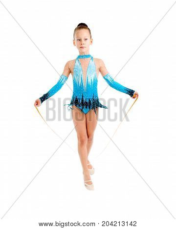 young girl doing gymnastics over white isolated,