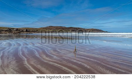 Achnahaird beach with interesting bands in the sand.
