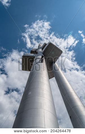 Prague, Czech Republic - August 21, 2017: Zizkov Television Tower in Prague. It is is a  transmitter tower and an example of high tech architecture. Low angle view a cloudy day of summer.
