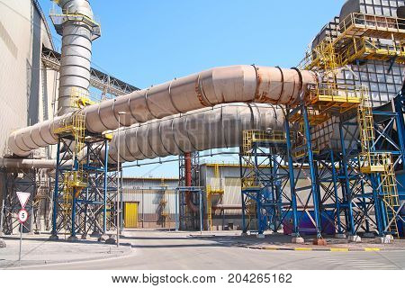 Ductwork Ventilation At Steel Foundry Outdoors, Against The Sky