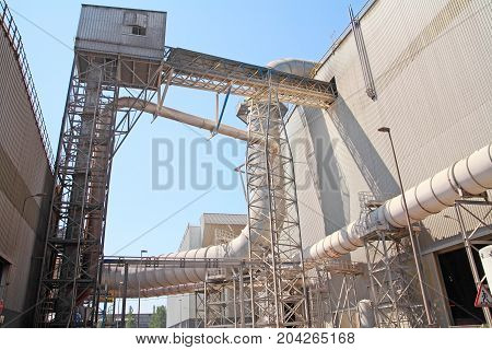 Ductwork Ventilation At Steel Foundry Outdoors, Against The Sky