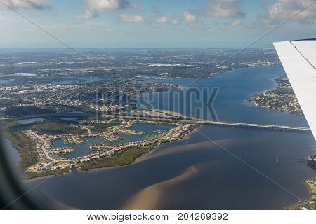Aerial view of city Bradenton Florida. Approach to land at the airport in St. Petersburg. Manatee River Florida