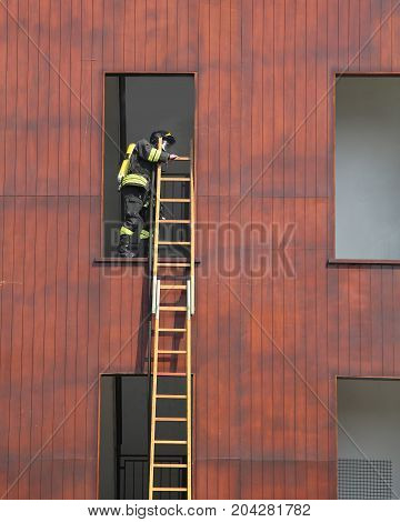 firefighter exercise while climbing in the fire station building