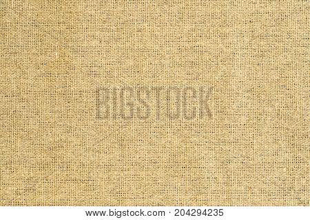 Natural Fabric Of Yellow Brown Sackcloth. Original Material. Background Texture.