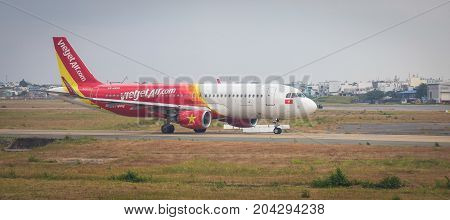 Aircraft On Runway At Airport In Saigon, Vietnam
