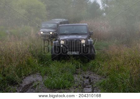 10.09.2017. Leningrad region. Russia. Jeep Wrangler with forest road in the Leningrad region. Wrangler is a compact SUV manufactured by Chrysler