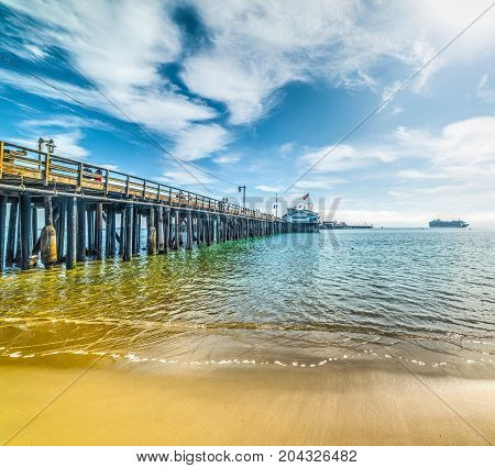 Wooden pier in Santa Barbara shoreline California