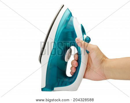 Classic electric iron with man's hand isolated on a white background.