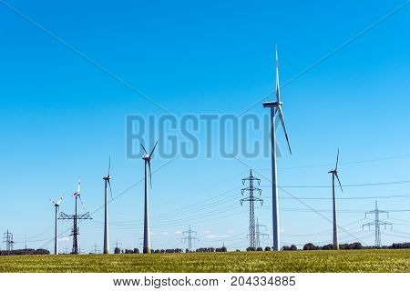 Wind energy and power transmission lines seen in rural Germany