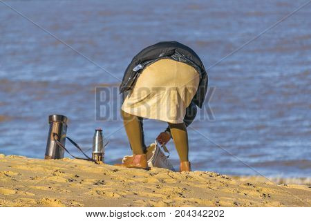 Woman At Beach At Winter Season