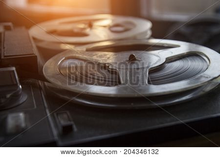 The old tape recorder is playing music